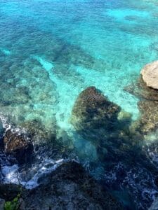 View of blue water around the cliffs of Negril, Jamaica