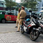 Vietnamese police standing guard looking for foreign travelers