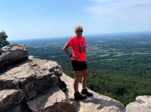 The Hostel Mom on a cliff overlooking the Shenandoah Valley in Virginia 