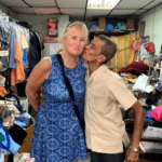 Getting a kiss from a local vendor in Panama