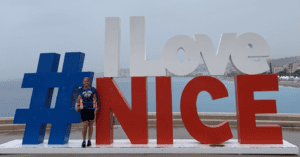 Standing at the I Love Nice sign in Nice, France