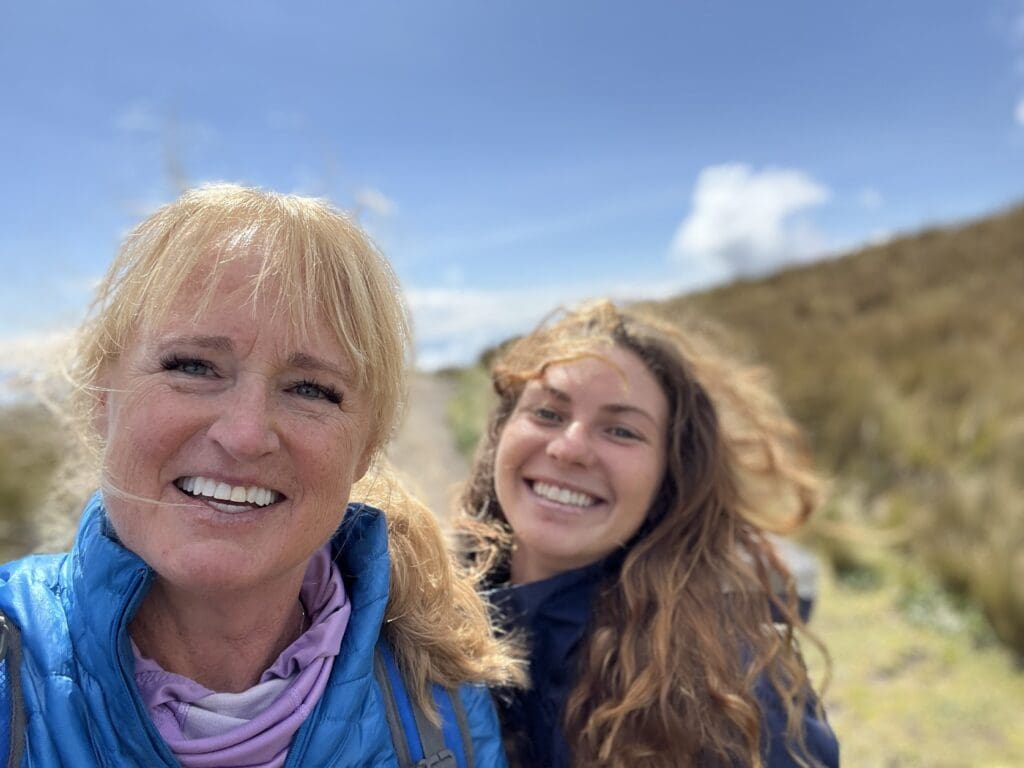 The hostel mom on a hike with a young traveler